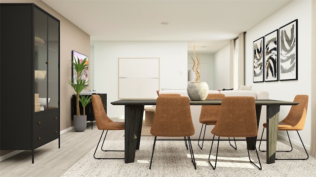 dining room featuring light hardwood / wood-style floors