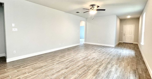 empty room featuring ceiling fan