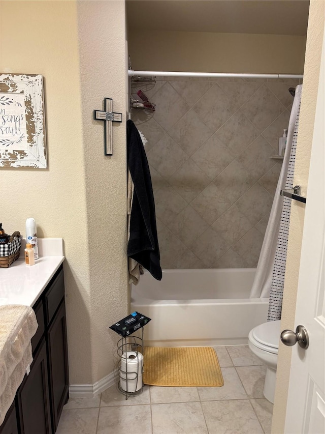 full bathroom featuring toilet, vanity, tile patterned flooring, and shower / tub combo with curtain