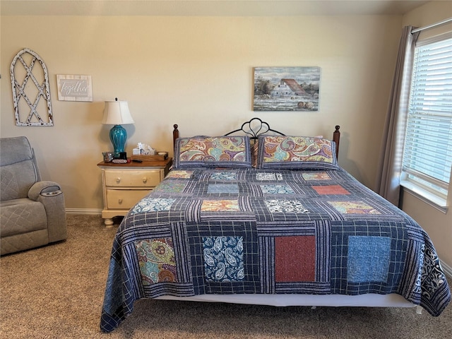 bedroom featuring carpet