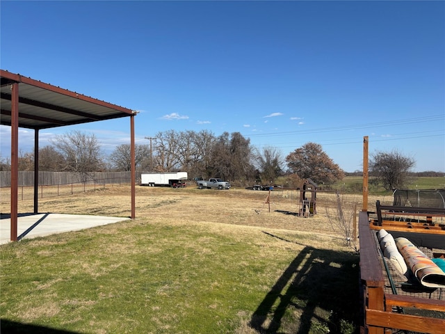 view of yard with a trampoline