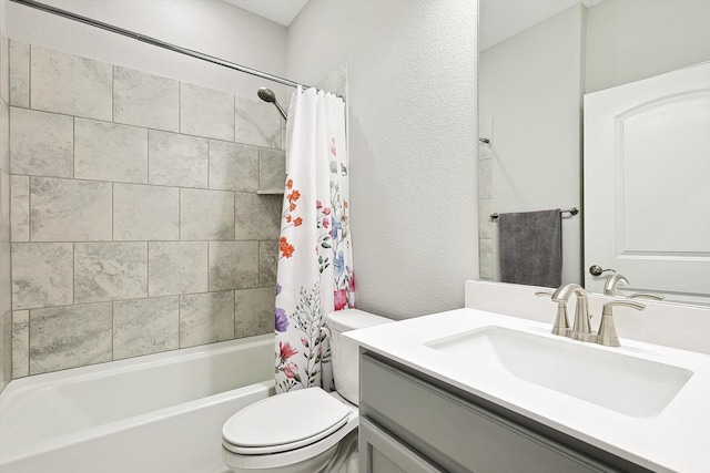 full bathroom featuring toilet, shower / tub combo with curtain, and vanity