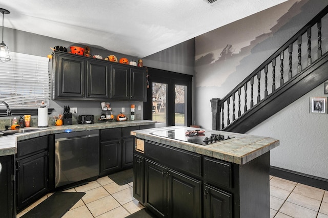 kitchen featuring light tile patterned floors, dishwashing machine, black electric cooktop, sink, and decorative light fixtures