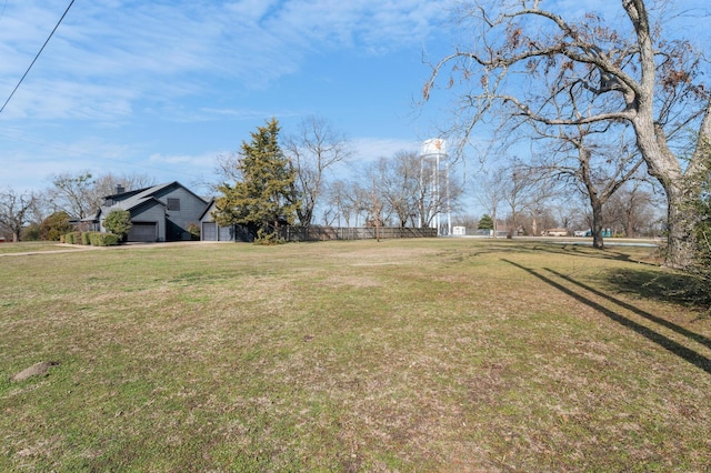 view of yard with a garage