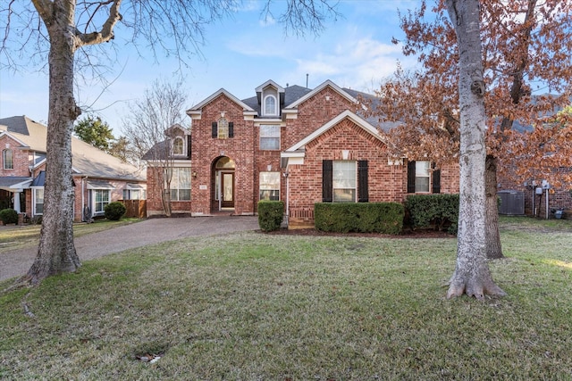 front facade with a front lawn