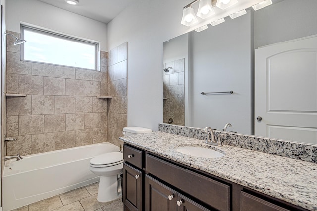 full bathroom with toilet, tiled shower / bath combo, tile patterned flooring, and vanity