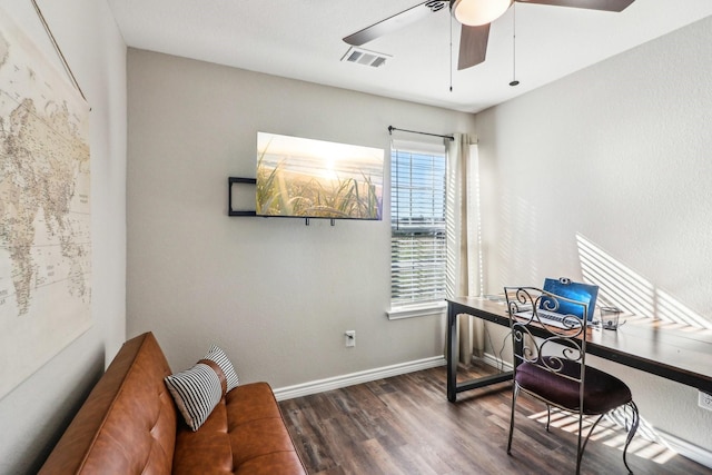 office space featuring ceiling fan and dark hardwood / wood-style flooring