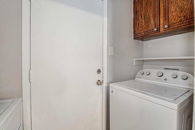 laundry room with cabinets