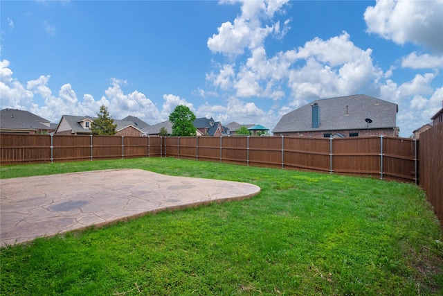 view of yard with a patio area