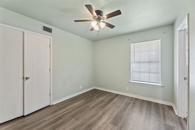 unfurnished bedroom with a closet, ceiling fan, and light hardwood / wood-style floors