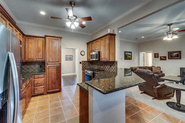 kitchen featuring stainless steel appliances, light tile patterned flooring, crown molding, and decorative backsplash