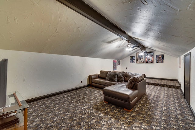 cinema with carpet floors and lofted ceiling with beams