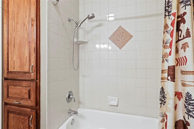 bathroom with shower / bathtub combination with curtain