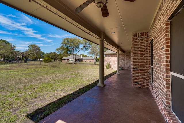 view of patio / terrace featuring ceiling fan