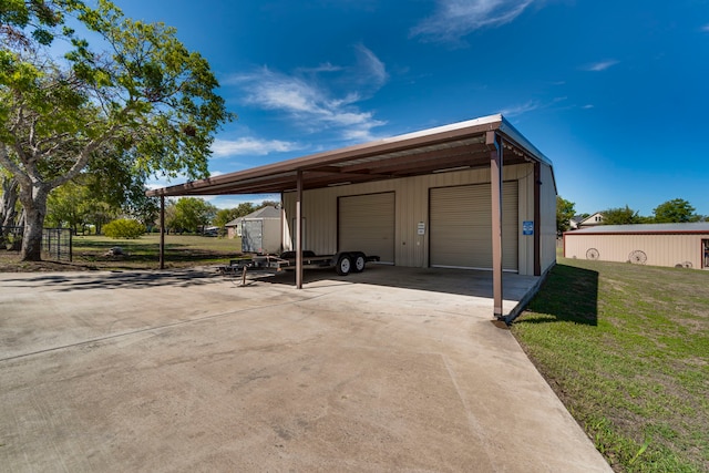 garage with a yard