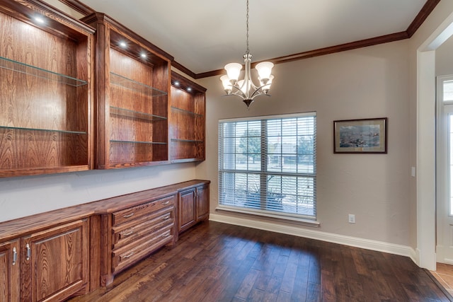 unfurnished office featuring baseboards, ornamental molding, dark wood finished floors, and a chandelier