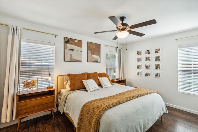 bedroom featuring ceiling fan and dark hardwood / wood-style flooring