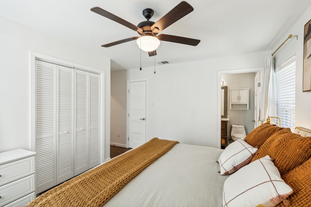 bedroom with ensuite bath, a closet, and ceiling fan