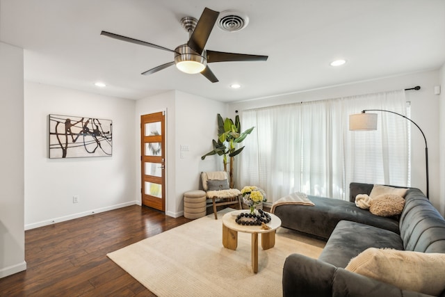 living room with ceiling fan and hardwood / wood-style flooring