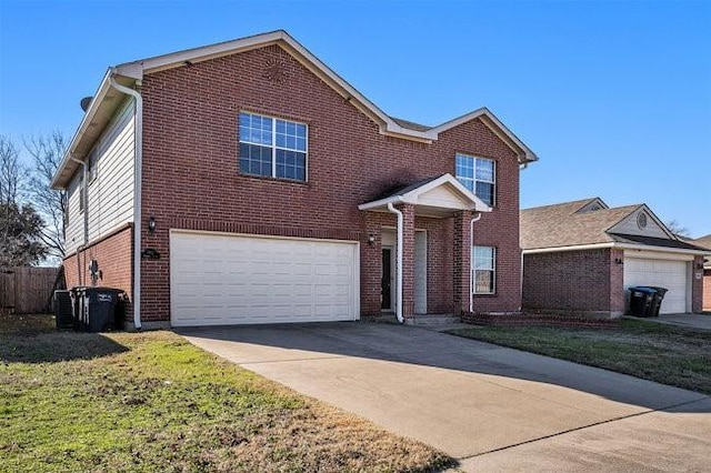 front of property featuring a garage and a front yard