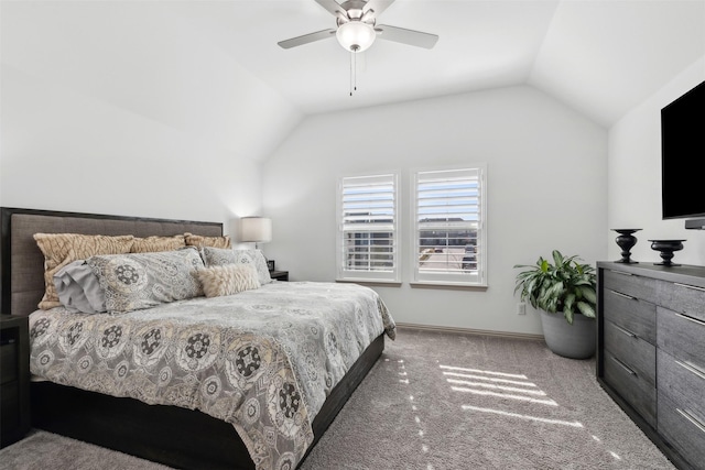 bedroom featuring ceiling fan, carpet, and lofted ceiling