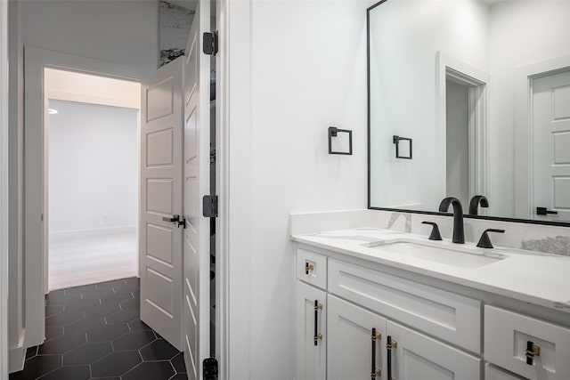 bathroom with vanity and tile patterned floors