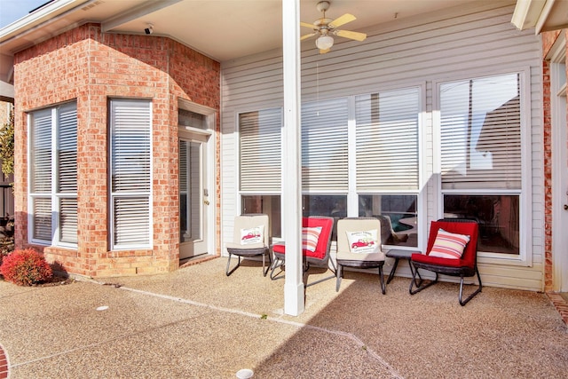 view of patio featuring a ceiling fan