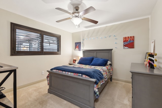 bedroom featuring ceiling fan and light colored carpet