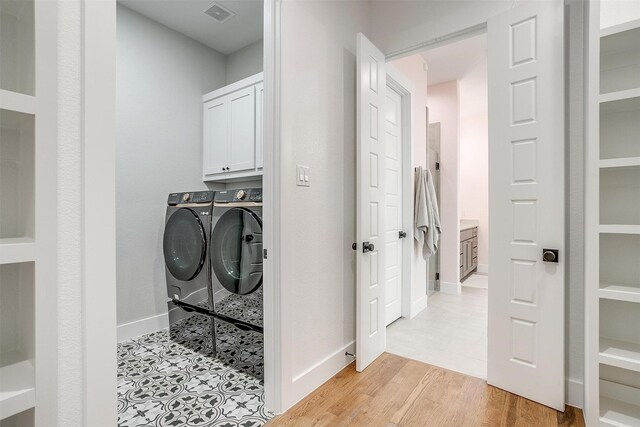 unfurnished bedroom featuring a closet, a towering ceiling, and light carpet