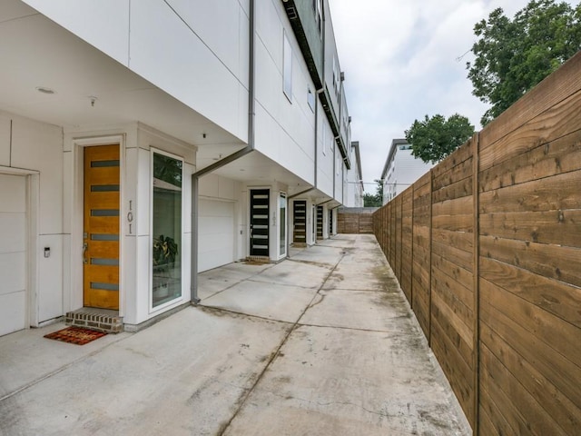 view of side of home featuring a patio area