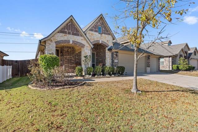 view of front of home featuring a front lawn and a garage