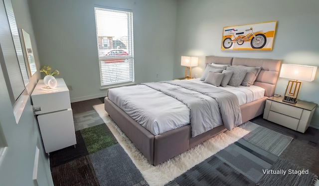 bedroom featuring dark wood-type flooring