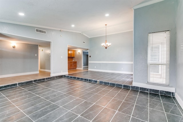 tiled empty room with lofted ceiling, an inviting chandelier, and crown molding