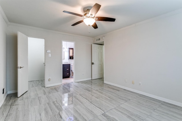 unfurnished bedroom with ceiling fan, crown molding, a spacious closet, and ensuite bath