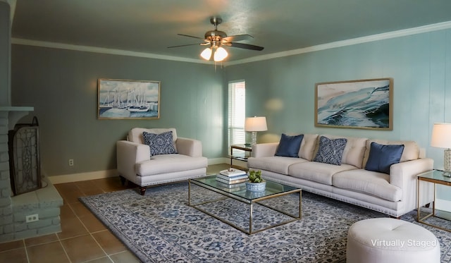 tiled living room with ceiling fan, crown molding, and a fireplace