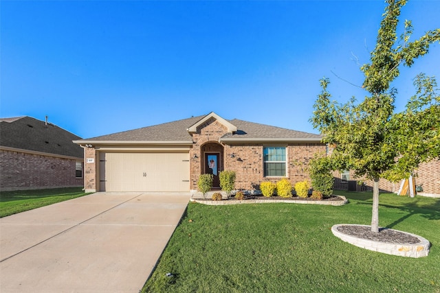 single story home with a front yard and a garage