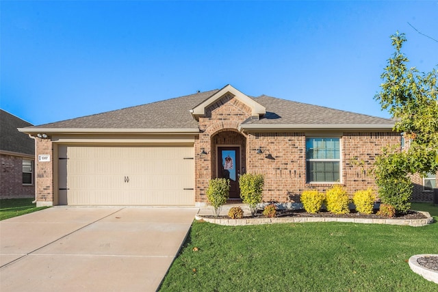 ranch-style home with a front lawn and a garage