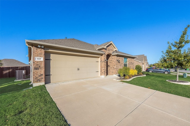 ranch-style home with central AC, a front lawn, and a garage