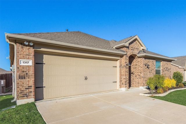 single story home with a garage