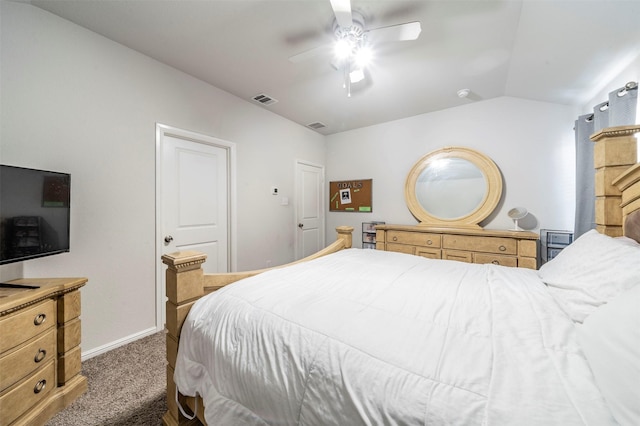 carpeted bedroom featuring vaulted ceiling and ceiling fan