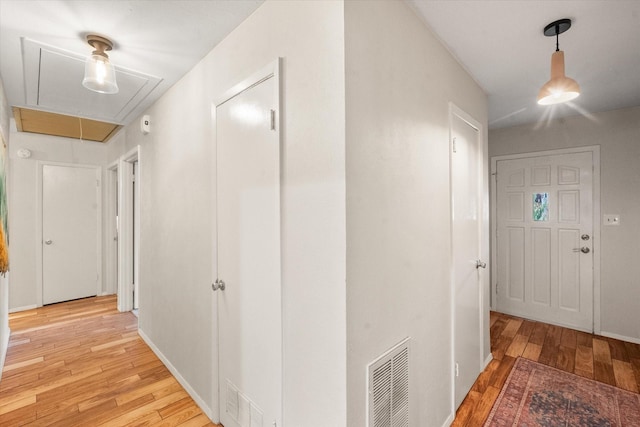 hall featuring light hardwood / wood-style flooring