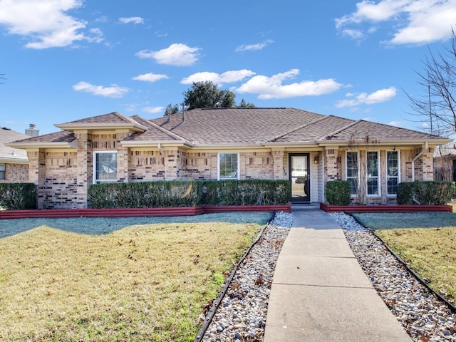 ranch-style home with a front yard