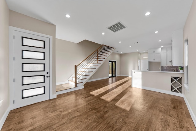 entrance foyer featuring light hardwood / wood-style flooring