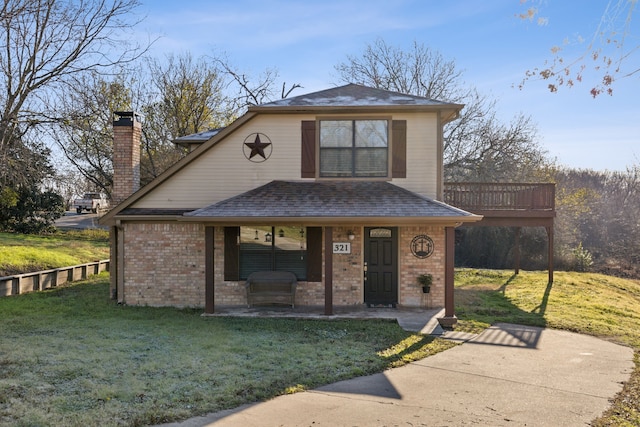 view of front of property featuring a porch and a front yard