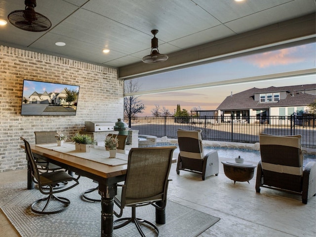 view of patio / terrace featuring ceiling fan