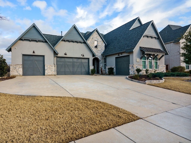 french country style house with a garage and a front yard