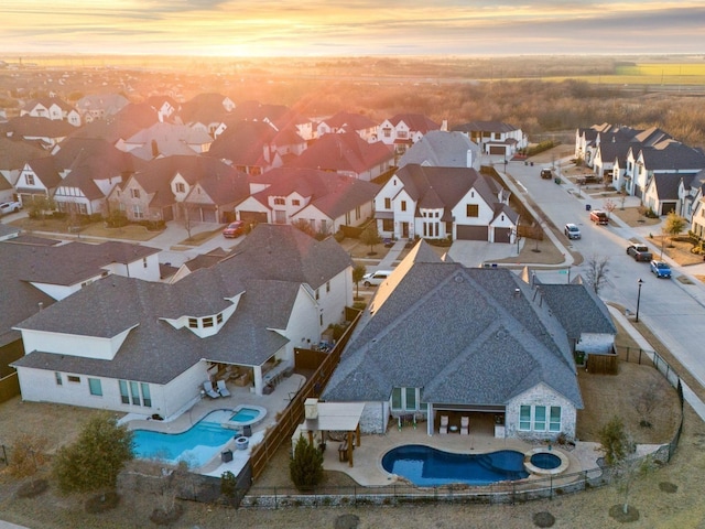 view of aerial view at dusk