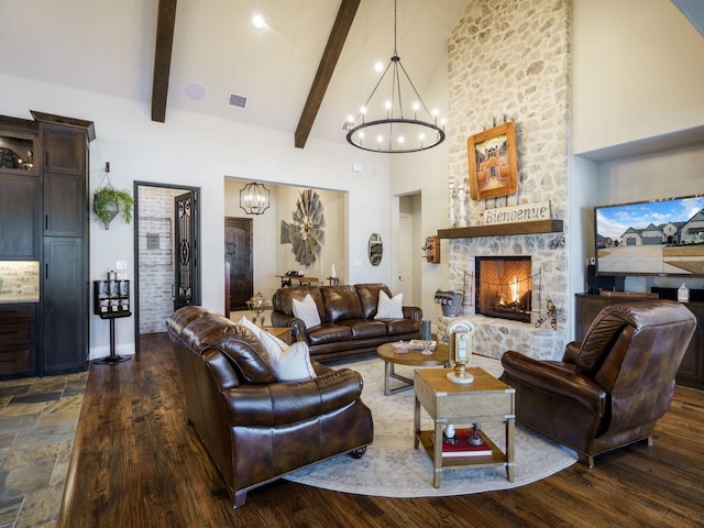 living room featuring an inviting chandelier, a fireplace, high vaulted ceiling, and beamed ceiling