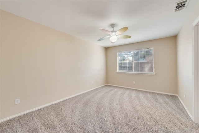 empty room with carpet floors and ceiling fan