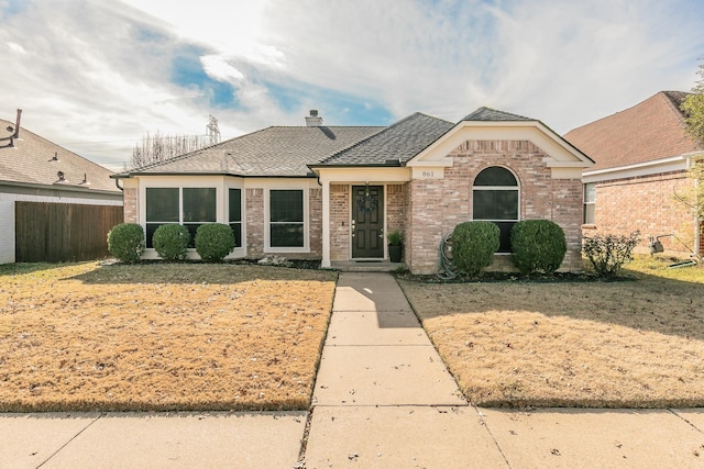 view of front of home with a front lawn